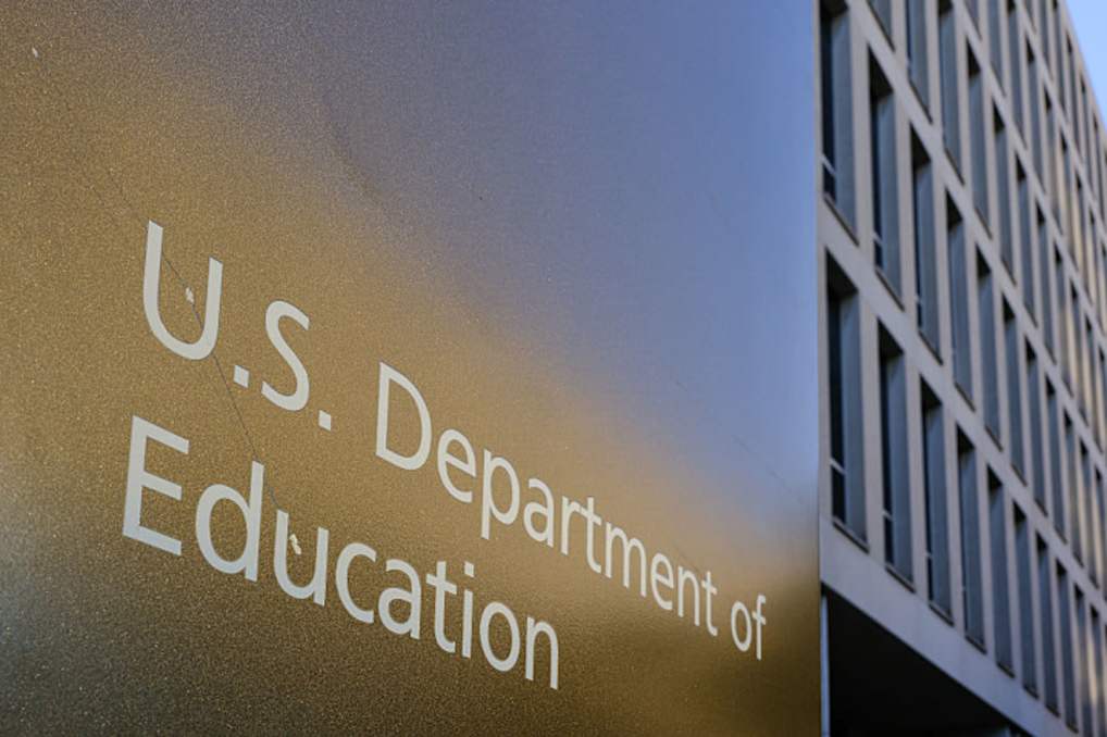 A sign marks the location of the U.S. Department of Education headquarters building