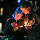 NEW HAVEN, CT - APRIL 3: Pam Shaw, mother of Rachael Shaw Rosenbaum, a Yale student who died by suicide last year in March 2021, attends a candlelight vigil organized by the group Elis for Rachael held on the New Haven Green. Comforting her is current Yale student Willow Sylvester, who met Shaw through Elis for Rachael, a group of Yale students, Yale alumni, and loved ones of Rachael Shaw-Rosenbaum that began meeting weekly via Zoom shortly after Rachael's passing to find a way to get much needed mental health reform on campus. The two had not met in person until the day of the vigil. (Photo by Stan Godlewski for the Washington Post)